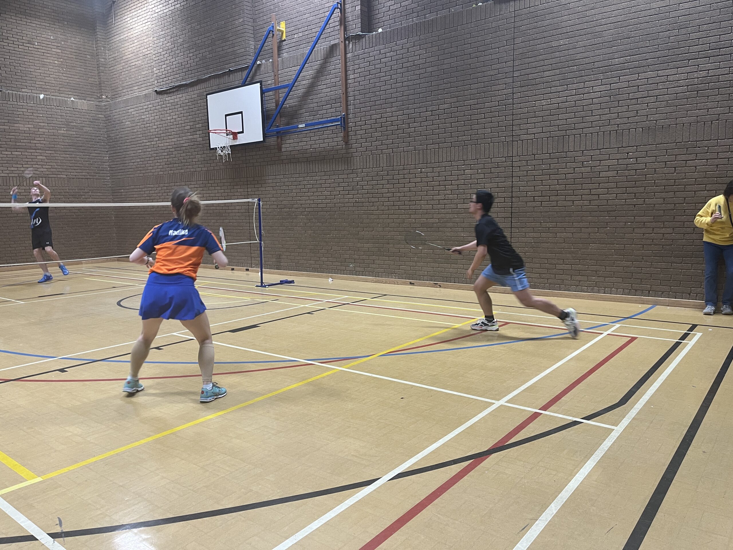 Icarus members playing a doubles game during club night