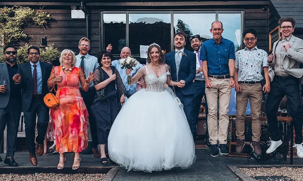 Icarus Badminton Club members celebrating together at a social event